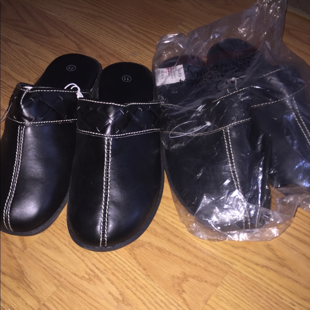 2 Black leather clogs